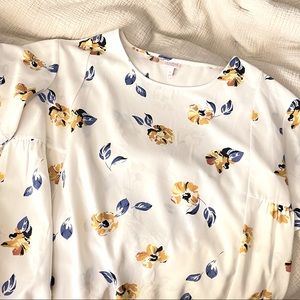 Silky cream top with floral details